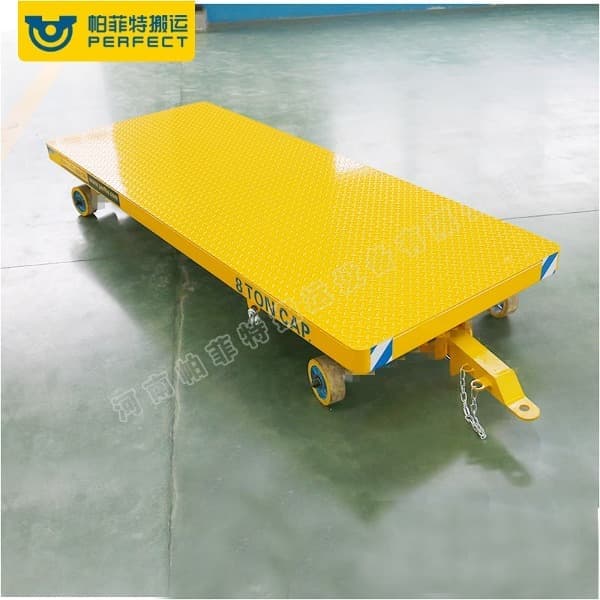 Flatbed towing transfer trailer and material handling trailer