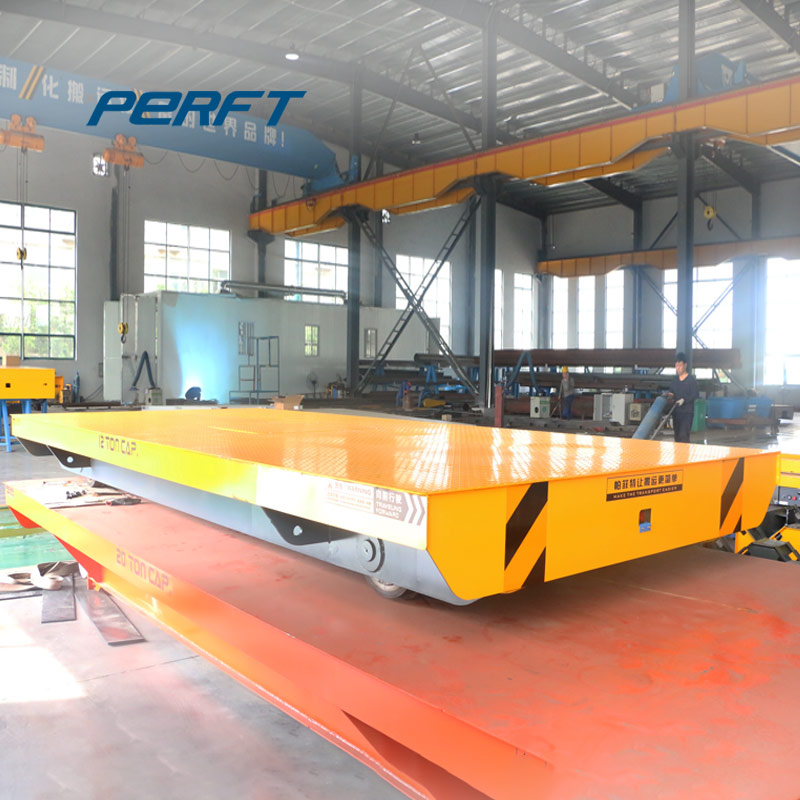 Supply electric railway car transport for between storage area and injection machine tranport