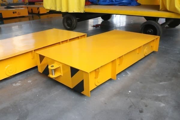 Low voltage rail supply flat trolley cart to move steel plate