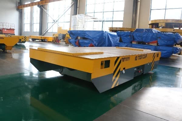 Low votage rail power transfer trolley to transport woodframe