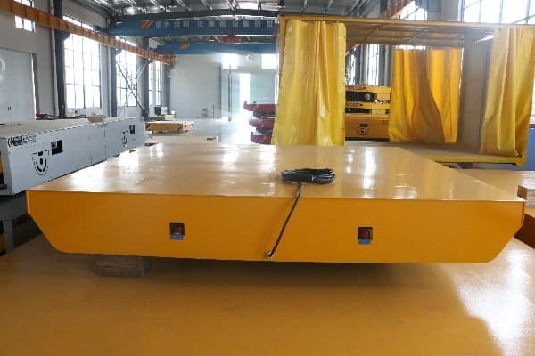 Tow drag cable power transfer cart on rail to move glass