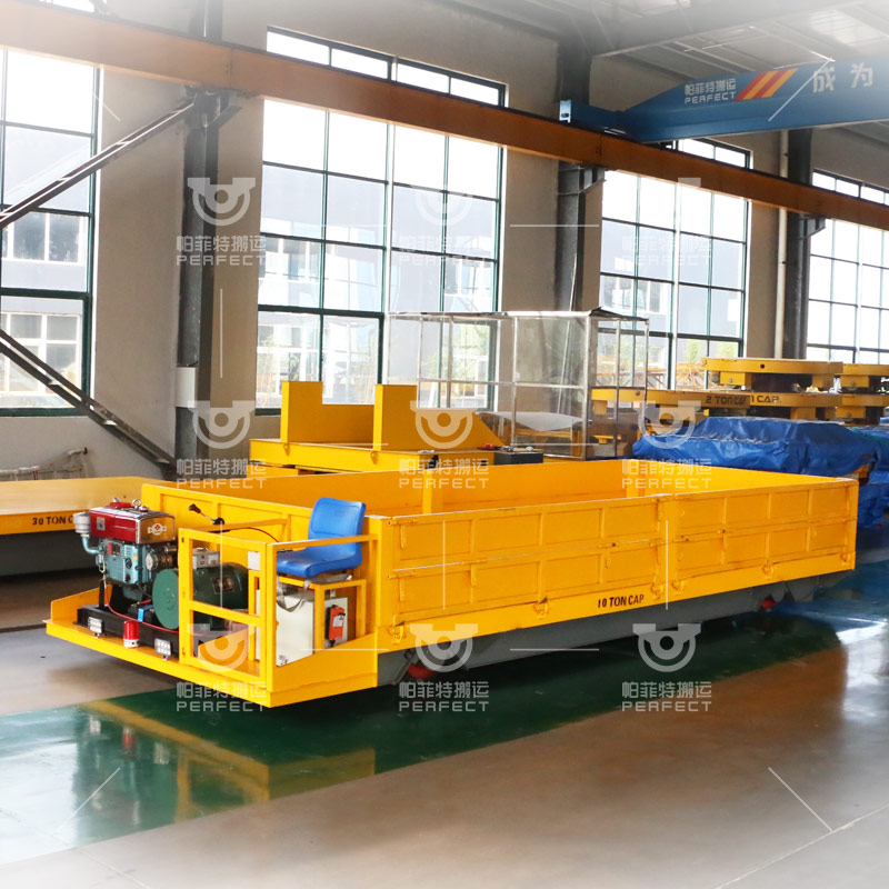 Cable powered rail transfer cart for warehouse